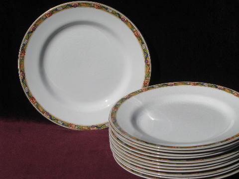 12 antique Johnson Bros china plates, oriental floral on mustard gold