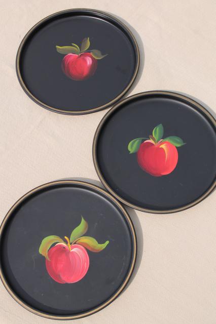 12 small round metal trays, vintage tole painted tray set w/ fruit designs on black
