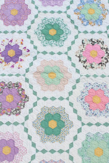 30s 40s vintage Grandma's flower garden quilt, cotton print fabric hexies on pink