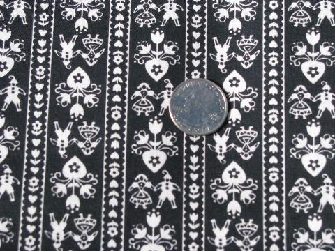 50s vintage folk art cotton fabric, hearts & tiny people print, white on black