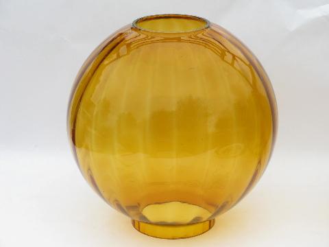 60s vintage hand blown glass lamp globes, mod round shape, amber color