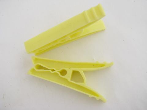 60s vintage yellow plastic spring clip clothespins, never used
