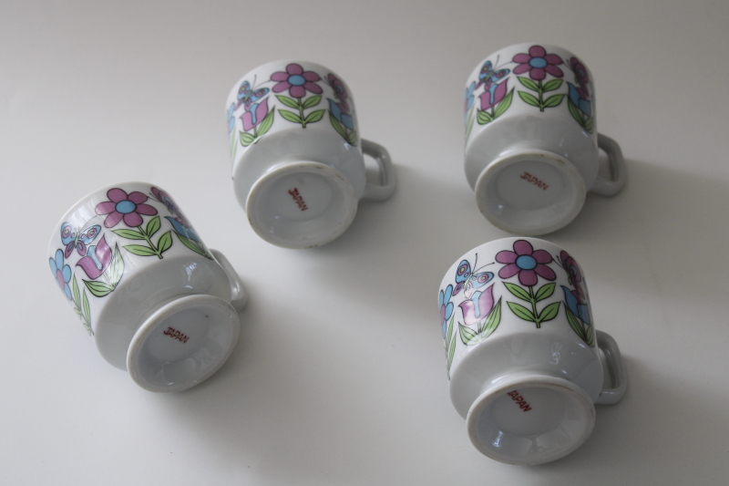 70s vintage Japan ceramic stackable mugs, retro floral blue  purple daisies  butterflies
