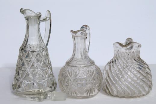 EAPG vintage pattern glass cruet bottles, heavy old glass pitchers, antique Fostoria jug