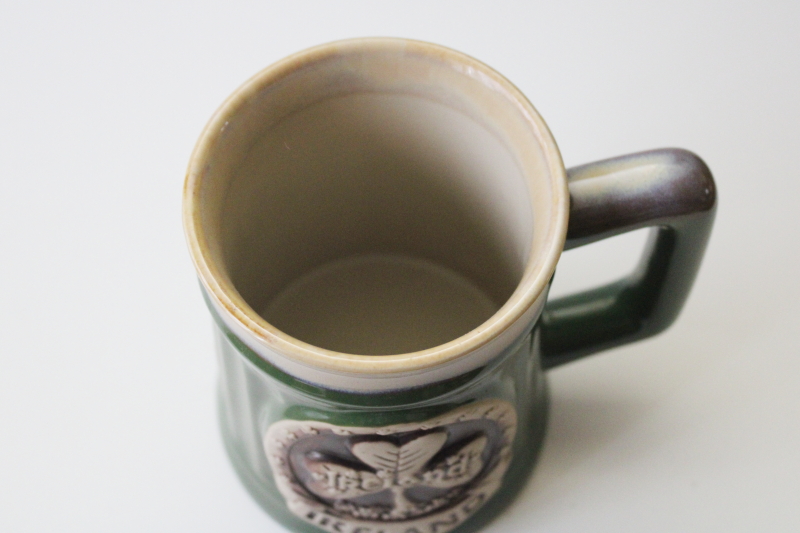 Ireland Irish stoneware coffee mug souvenir, Deneen style pottery shamrock emblem