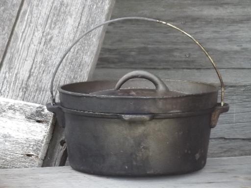 Lodge cast iron dutch oven, large campfire cooking pot w/ lid for coals 