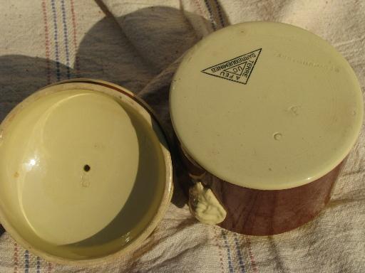 Sarreguemines french majolica pottery, old yellow / mocha lidded jar w/ face handles