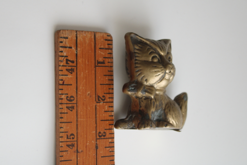 Taiwan label vintage solid brass paperweight figurine, small cat or kitten, kitty w/ bow