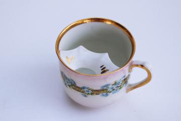 Victorian era antique china mustache cup marked Germany, forget me nots floral on pink w/ gold