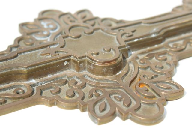 antique cast brass or bronze decorative hardware, celtic scrolls architectural ornament