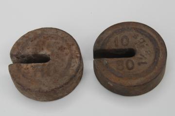 antique cast iron scale weights, large round weights rusty crusty vintage farm primitives