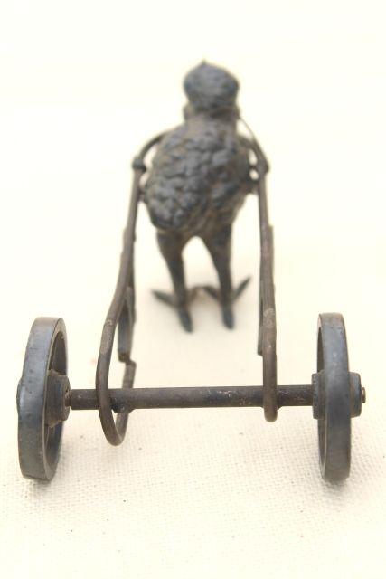 antique cast metal figural inkwell or egg holder, baby chick w/ cart