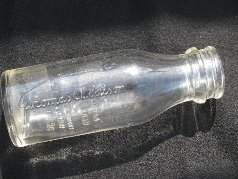antique embossed glass Edison Battery Oil bottles, machine age vintage