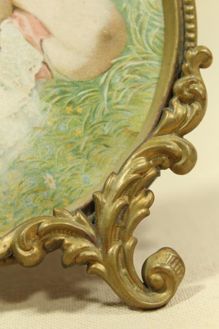 antique gilt picture frame w/ litho print young girl, small round ornate embossed brass frame