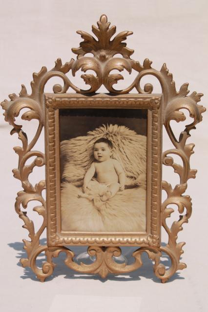 antique gold cast metal picture frame w/ vintage sepia tone baby photo