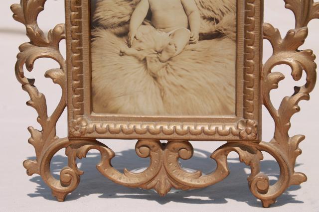 antique gold cast metal picture frame w/ vintage sepia tone baby photo