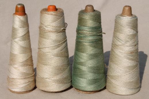 antique green colors primitive grubby old spools of vintage cotton cord thread
