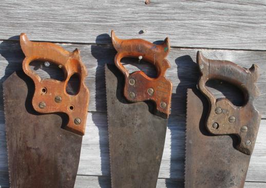 antique hand saws, lot of Henry Disston saws 1860s medallion thumbhole handle