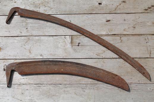 antique hand scythe blade, lot of rusty iron reaper's scythe blades for harvesting or Halloween props