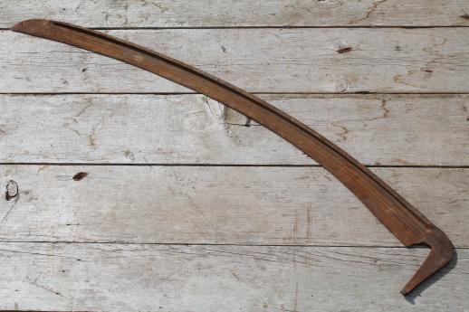 antique hand scythe blade, lot of rusty iron reaper's scythe blades for harvesting or Halloween props