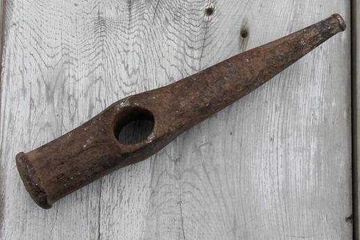 antique iron coal pick hammer head, old miner's tool or coal stove pick