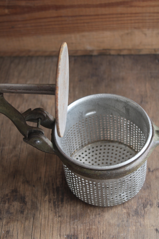 antique kitchen tool, potato ricer King Cincinnati galvanized sieve w/ embossed cast iron handle