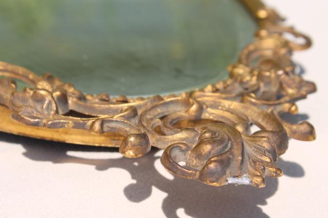 antique vintage beveled glass mirror w/ ornate old gold metal oval frame