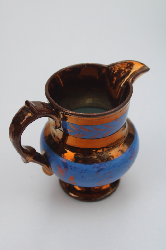 antique vintage copper lustre luster pottery pitcher, blue band redware clay