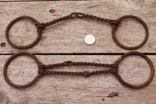 antique vintage horse bits, snaffle bits - rusty old tack for primitive rustic display
