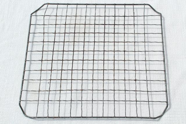 antique vintage kitchenware, old crimped wire cooling racks for pies or other baking