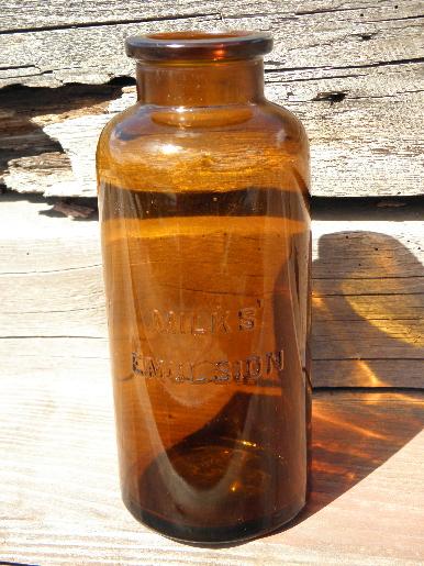 big old amber glass patent medicine bottle, Milks Emulsion display jar