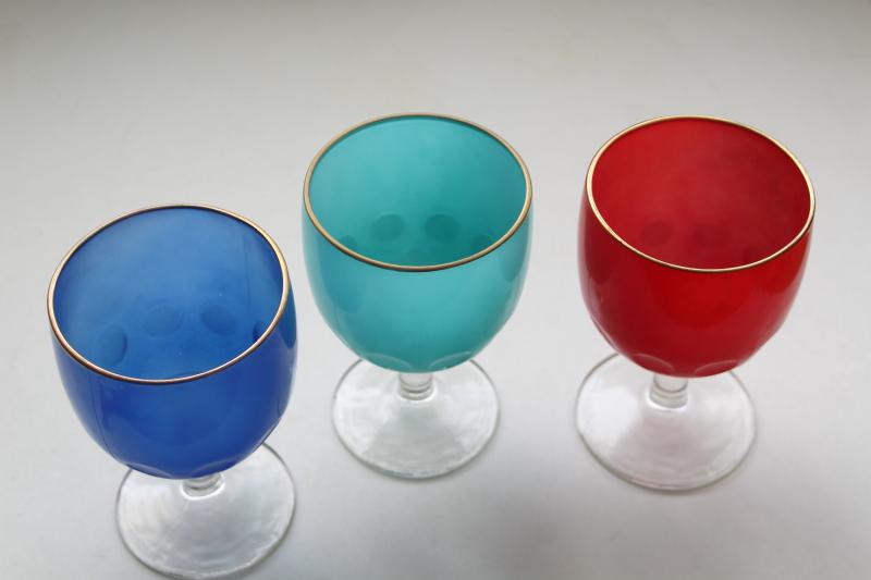 big vintage wine glasses or water goblets, retro colors red aqua blue