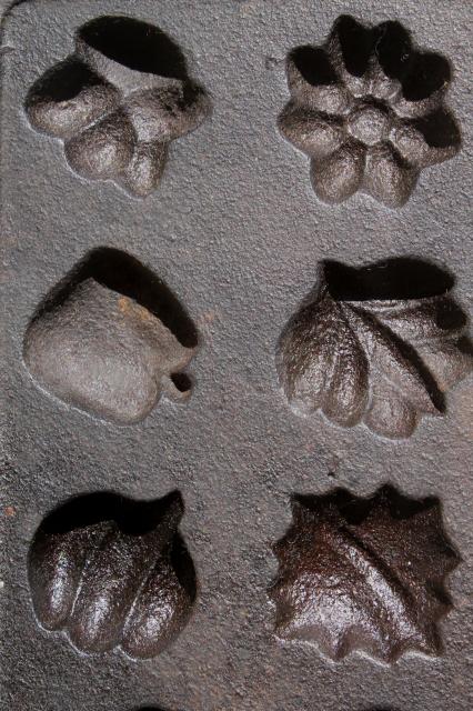 cast iron maple sugar mold for making tiny leaves, acorns, pumpkins, fall fruit