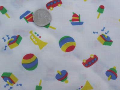 child's toy print fabric in bright colors