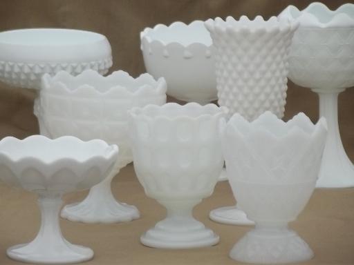 collection of vintage milk glass vases, pedestal bowls, compotes each different