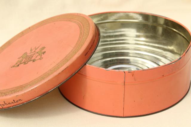 collection of vintage tins in faded colors, coral red, pink, blue