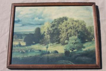 faded vintage print, pastoral landscape scene cows on pasture in shabby wood picture frame
