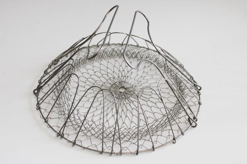 french kitchen style wire steamer colander or egg basket, collapsible shape