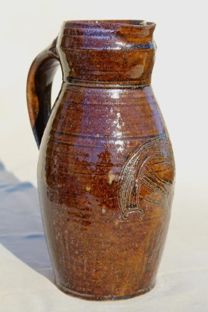 hand thrown pottery milk pitcher or rustic vase, brown glazed heavy stoneware, artist signed