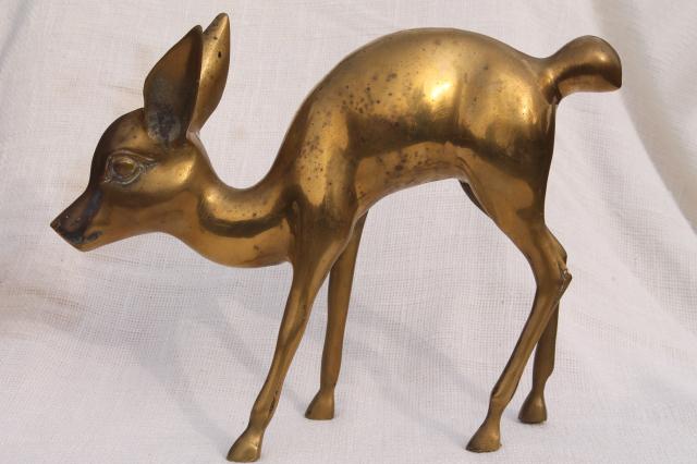 large brass deer statues
