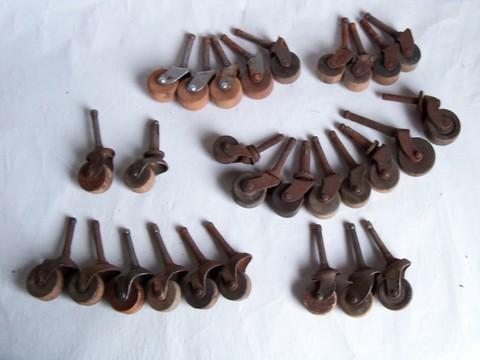 large lot of 28 antique vintage wooden wheel casters for furniture restoration