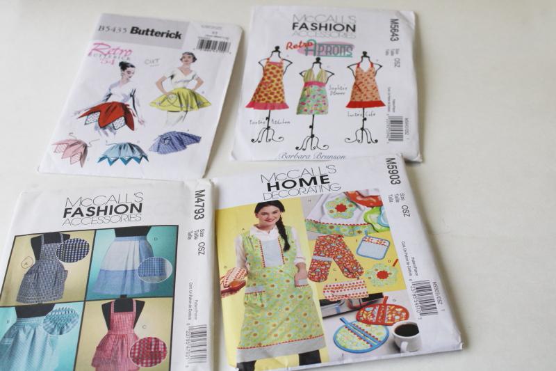 large lot out of print sewing patterns all kitchen aprons, full & half aprons