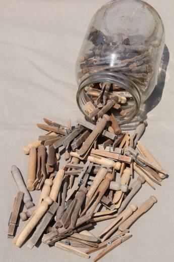 large old gallon jar full of vintage clothespins, primitive wood clothespins lot
