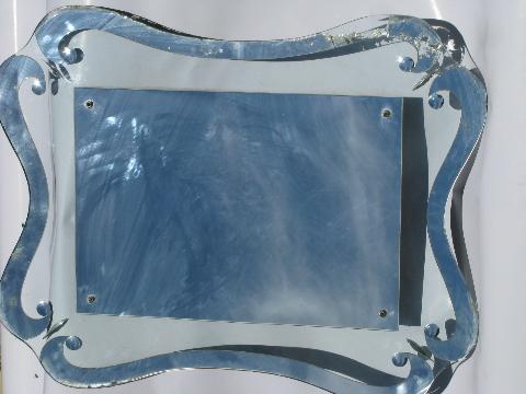 large vintage glass mirror with scalloped edge, old worn silvering
