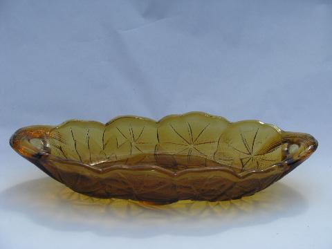 lily pons flower pattern, vintage Indiana amber & clear glass celery dishes