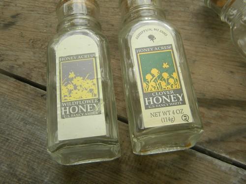 lot of 4 glass Honey Acres bottles w/cork stoppers for breakfast table