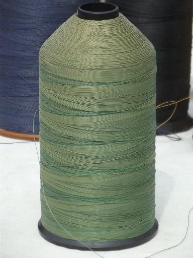 lot of huge old cone spools of heavy duty thread for leather stitching