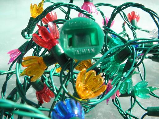 lot old midget Christmas tree lights, fancy plastic flower reflectors