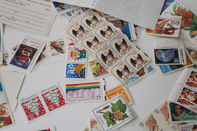 lot unused USPS postage stamps  postcards, Christmas design stamps, flowers, Elvis etc