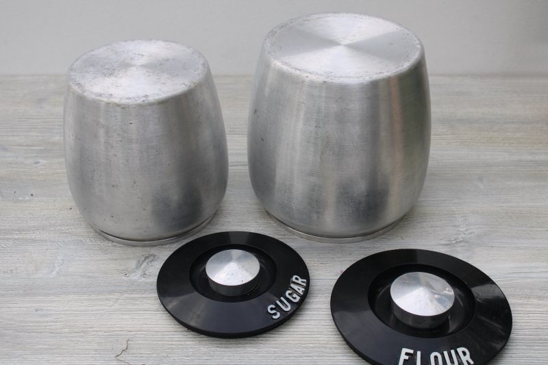 mid-century modern vintage Kromex metal canisters, spun aluminum canister set